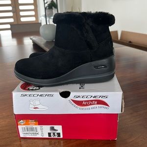 Brand new in box Skechers Arch Fit Black Boots with a wedge